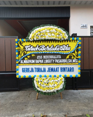Papan Bunga Duka di Dekai